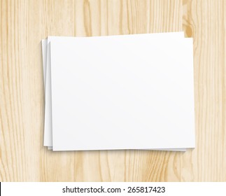 Blank sheet of paper set on wood texture background