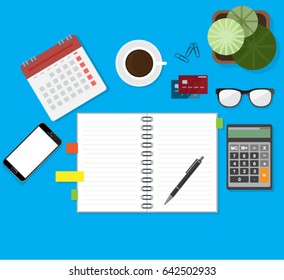 Blank sheets of paper on the desktop. 