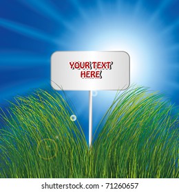Blank sign in grass
