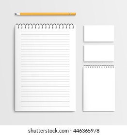 Blank spiral notebook, 
business card, pencil mockup