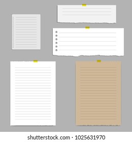 Blank squared notepad pages and tape. Note paper stuck with beige sticky tape.