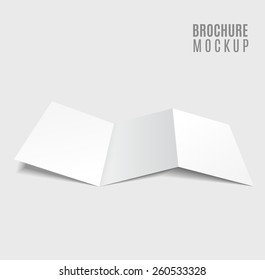 blank tri-fold brochure design isolated on grey