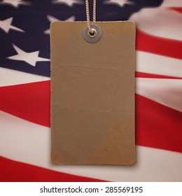 Blank, vintage, realistic price tag on American flag background. Vector illustration.