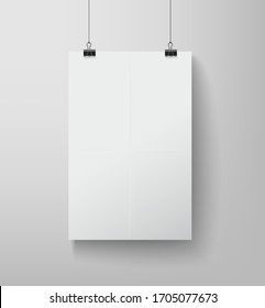 blank white banner hanging on the clamps on white background