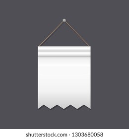 Blank white flag with sharp end hanging on gray background