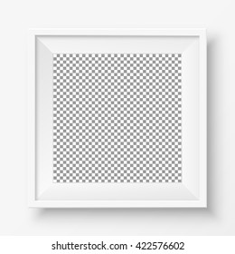 Blank white frame hanging on gray wall.