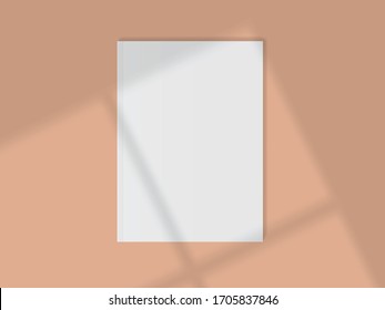 blank white magazine on a beige background with reflection from the window mock up