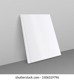 Blank white magazine realistic mockup, A4 format thick brochure or thin book with empty front page leaning against a grey wall, realistic 3D style vector illustration