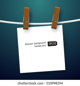 Blank white notes hanging on clothesline