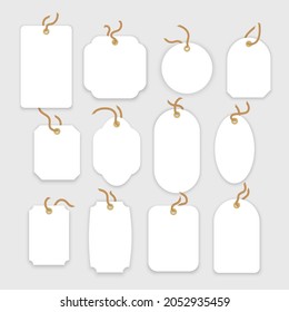 Blank white paper price tags or gift tags in different shapes. Set of labels with cord. Vector format