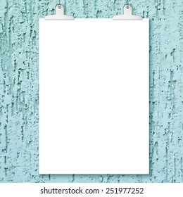 Blank white poster hanging on plaster monochrom wall background. Overlay dust grainy texture for your design. Decorative render.