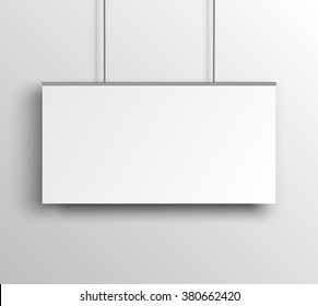 Blank white poster mockup hanging on the white wall