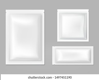 Blank white sachets for wet wipes, sauces or spices, easy tear sealed, rectangular plastic, foil or polythene packets isolated 3d realistic vector illustration. Food products airtight packaging mockup