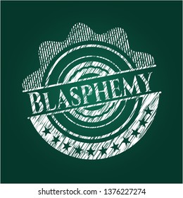 Blasphemy chalk emblem written on a blackboard