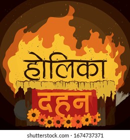 Blazing pyre ready for Holika Dahan (texts written in Sanskrit calligraphy) with traditional elements of this celebration: wood logs, cow dungs, dry grass and wreath marigold flowers.