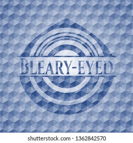 Bleary-eyed blue emblem with geometric pattern background.