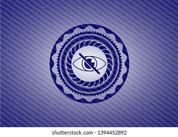 blind icon inside badge with denim texture