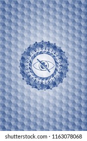 blind icon inside blue emblem with geometric pattern.