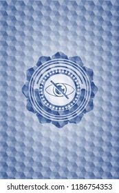 blind icon inside blue emblem with geometric pattern.
