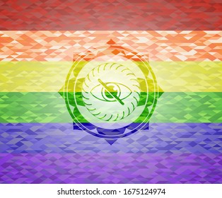 blind icon inside emblem on mosaic background with the colors of the LGBT flag
