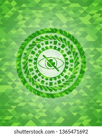 blind icon inside green mosaic emblem