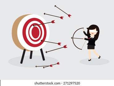 Blindfold business woman try to hit a target