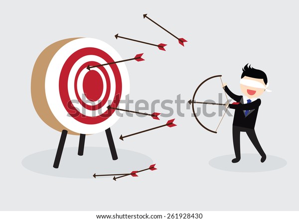 Blindfold businessman try\
to hit a target