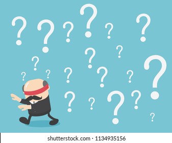 Blindfolded businessman walking of question marks