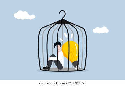 Blocking business idea, stucking in bad workplace, rivalry for better position in organization concept, toxic environmental office concept. Dismal businessman stucking in cage with bright light bulb.