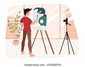 Blogger artist. A man draws a picture for an educational podcast on a blog, filming everything on camera.