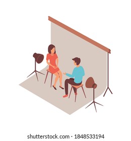 Blogger isometric composition with sitting interviewer and guest characters with lighting equipment and studio cyclorama vector illustration