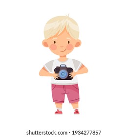 Blond Boy Holding Camera and Taking Photo Vector Illustration