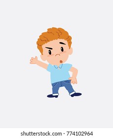 Blond boy in jeans something angry shows something to his right.