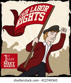 Blond haired young man ready to march with a commemorative red flag in Workers' Day and a big crowd.