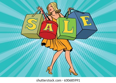 Blond woman with shopping bags sale