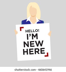 Blond woman in suit holding Hello I'm New Here Sign