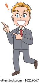 Blond young business man in suit.He has positive emotion.