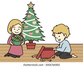 Blonde boys and girls getting Christmas gifts