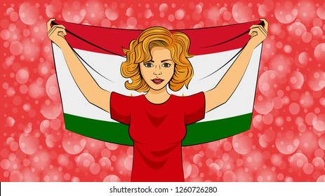 Blonde girl holding a national flag of Tajikistan
