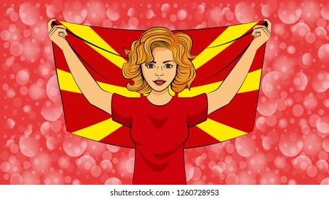 Blonde girl holding a national flag of Macedonia