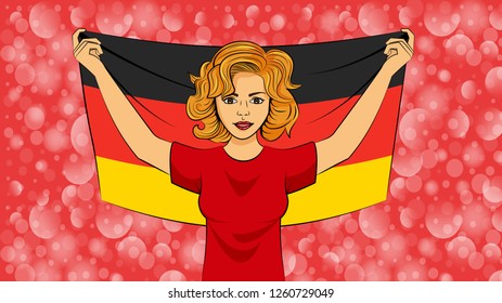 Blonde girl holding a national flag of Germany