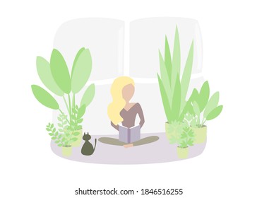 Blonde girl in yoga position reading a book in front of the window in her urban jungle between plants along with a black cat. Staying home concept and social distancing due to coronavirus pandemic