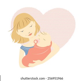 Blonde mother holding baby in front of a heart.