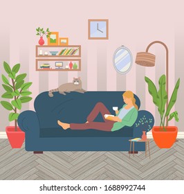 Blonde woman lying on sofa, reading interesting book and has cup in hand. Girl drink tea or coffee. Books on shelf, plants on floor, pet on couch. Vector illustration in flat style