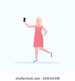 blonde woman taking selfie photo on smartphone camera casual female cartoon character posing white background flat full length