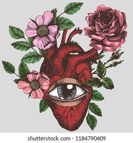 Blooming anatomical human heart with eye. Vector hand-drawn illustration in vintage style. Design for your tattoo, logo or other.