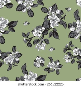 Blooming branches on a green background.Vector seamless pattern. Endless texture can be used for wallpaper, pattern fills, web page background,surface textures.