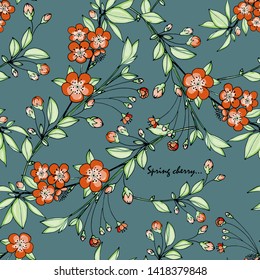 Ramas de cerezo florecientes y hojas verdes sobre el fondo azul. Patrón floral sin soldadura. Dibujo dibujado a mano, doodle. Vector.