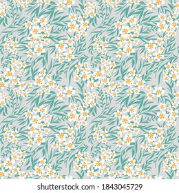 Blooming meadow seamless pattern. Trendy color for fashion. wallpapers, and print. A lot of flowers.  Ditsy style. Pressed flowers. Trendy floral design