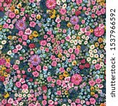 Blooming midsummer meadow seamless pattern. Plant background for fashion, wallpapers, print. A lot of different flowers on the field. Liberty style millefleurs. Trendy floral design